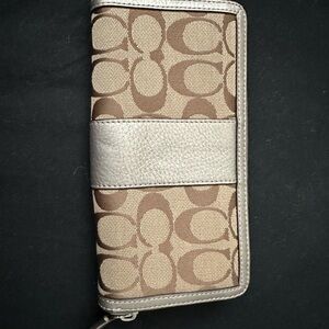 Used Coach zip around wallet.